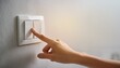 © Sophia - Close up of Female finger is turn off on lighting switch at home. Power, Energy, Saving Electrical, Copy space. Created with Generative AI technology.