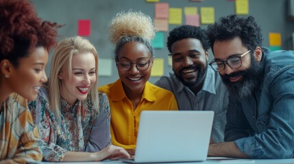 Poster - A group of people are smiling and looking at a laptop