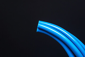 Blue cable close-up on black background