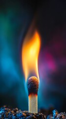 Wall Mural - burning matchstick with colorful smoke and flames on dark background