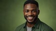 © Serhii - portrait of a black man on a green background