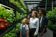 © Road Red Runner - A young family exploring the wonders of urban agriculture in a modern vertical farm filled with vibrant greens and fresh produce