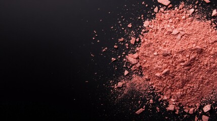 Poster - Delicate shards of rose-gold highlighter powder lie scattered on a sleek matte black surface, showcasing its fine texture and luxurious shine. The composition allows for added branding