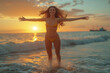 © TRAVELARIUM - Joyful young woman in bikini with arms outstretched, enjoying sunset at beach with vibrant sky, girl enjoys summer holiday at sea and warm weather