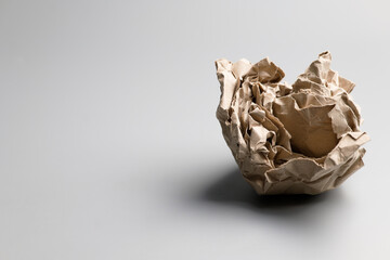 Canvas Print - A crumpled paper ball on gray background, symbolic object of mistake, fail, and unsuccess idea, development and creativity concept