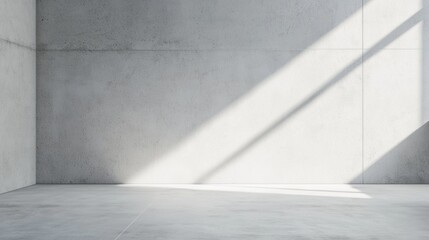 Poster - Bright sunlight creates geometric shadows on a concrete wall in an empty room, adding depth and texture to the modern design