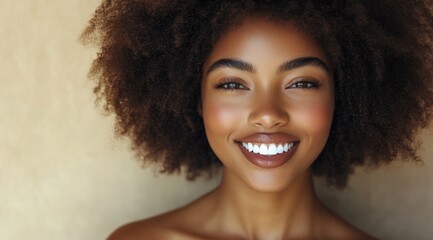 Wall Mural - portrait of an African American woman with natural hair, smiling and looking at the camera against a beige background. 