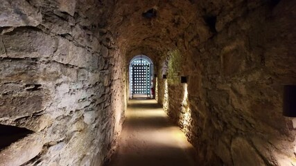 Wall Mural - Backward movement from a beautiful medieval interior corridor in a castle, France.