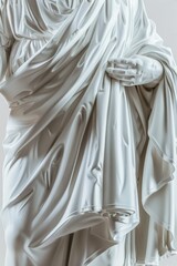 Poster - A statue of a woman dressed in flowing white attire