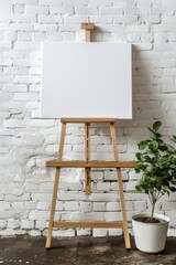 Poster - A wooden easel with a blank canvas and a nearby potted plant, ideal for artistic or decorative purposes