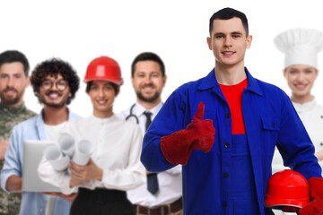 Wall Mural - Technician and people of other professions on white background, selective focus