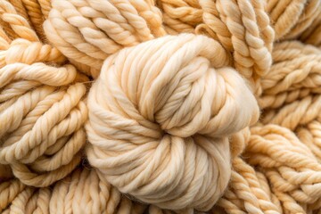 Wall Mural - Detailed close-up of cream-colored yarn with soft texture