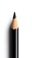 Black pencil tip with wooden body, isolated on white background.