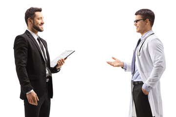 Canvas Print - Professional man in a suit talking to a male doctor