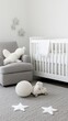 © ZinaZaval - The airy nursery showcases a baby bed, a changing table, and a soft armchair, emphasizing minimalism with wooden furniture and gentle lighting for a serene atmosphere