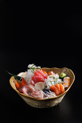 sashimi set japanese food isolated in black background