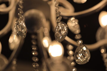 Poster - A close-up shot of a decorative chandelier with multiple lights.