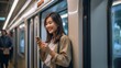 © waliyah - Smiling Woman on a Train, Checking Her Phone