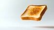 © DZMITRY - Slice of toasted bread close-up on white background