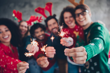 Sticker - Photo of attractive young people employees hold bengal light new year decoration interior corporate party office