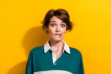 Sticker - Photo of scared unsure woman wear polo shirt biting lip having problems isolated yellow color background