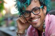 © Halina Berah - Black male standing on street with blue hair and eyeglasses and cheerfully looking at camera