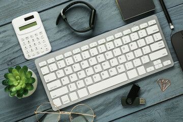 Wall Mural - Modern keyboard and different devices on grey wooden background