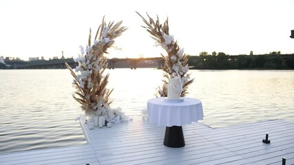 Sticker - a large wedding cake by the arch for the evening ceremony