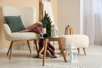 Poster - Armchair and Christmas lanterns in interior of living room