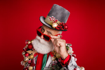 Canvas Print - Photo of funky cool grandfather dressed noel costume looking you enjoying x-mas emtpy space isolated red color background