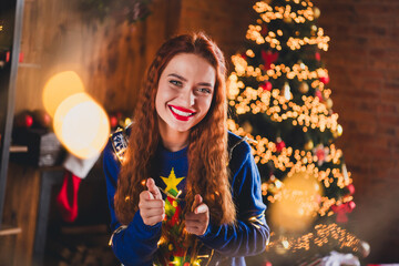 Sticker - Photo of charming positive girl wear blue sweater look camera dance new year party indoors