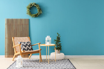 Poster - Interior of living room with Christmas tree, table and armchair