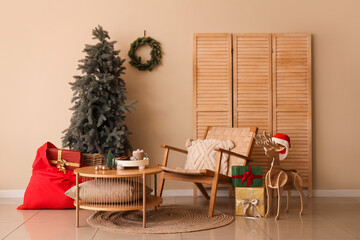 Sticker - Interior of living room with armchair, Santa bag and Christmas tree