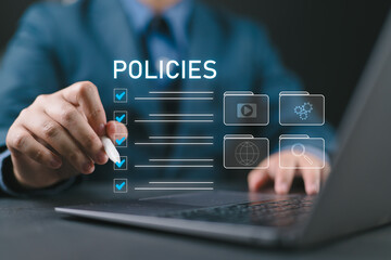 Poster - Businessman checking the steps through a virtual online document with a list of checkboxes Concepts of practices and policies, company articles of association Terms and Conditions,Privacy Policy