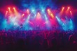 © Lexyat - A live band performs on stage in front of a large crowd. The stage is illuminated with colorful lights, creating a festive atmosphere.