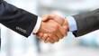 © ZIHAO - Two businessmen shaking hands in a modern office, symbolizing a successful merger and collaboration, professional handshake in corporate environment.