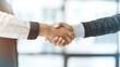 © 楠 刘 - Two businessmen shaking hands in a modern office, symbolizing a successful merger and collaboration, professional handshake in corporate environment.