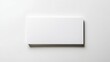 © Korawich - Rectangular white paper on white background.
