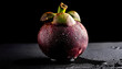© Saddha Visual - Close-up of fresh Mangosteen with water drops on a pitch solid black background