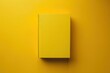© Your Choice - A vibrant yellow book rests on a matching backdrop, inviting curiosity and creativity in a minimalist setting
