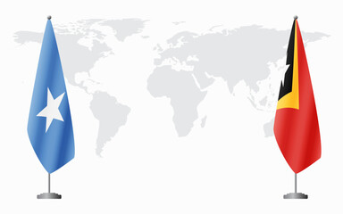 Canvas Print - Somalia and East Timor flags for official meeting against background of world map.