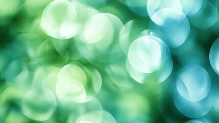 Poster - Blue-green abstract bokeh background, soft, overlapping circular shapes with smooth gradients from light to dark, created using a macro lens for a dreamy look. Space for copy.