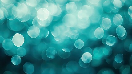 Fototapete - Blurred blue-green background with bokeh circles, soft light transitions, macro photography creating space for creative design with text.
