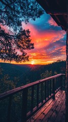 Wall Mural - A stunning sunset view from a rustic balcony, surrounded by trees, showcasing vibrant colors and serene nature.