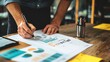 © LOMOSONIC - Productive Business Consulting Session - Hand Taking Detailed Notes for Strategy Success