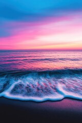 Wall Mural - Serene sunset over calm ocean waves, showcasing vibrant colors of pink, purple, and blue reflecting on tranquil water, creating a peaceful atmosphere.