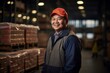 © Baba Images - Portrait of a joyful middle aged male Asian warehouse worker