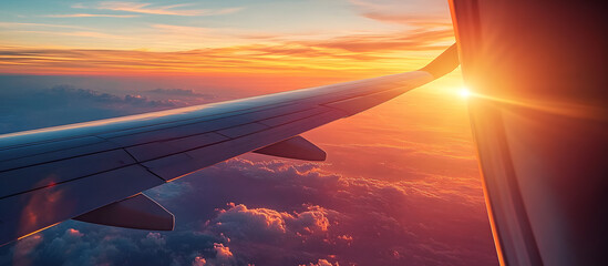 Poster - Scenic sunrise seen from an airplane with copy space image at 10 000 meters altitude