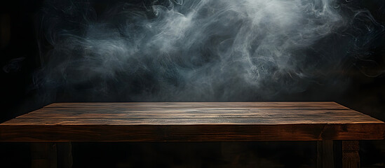 Sticker - A dark background enhances the visual appeal of an empty wooden table with smoke rising creating an atmospheric and artistic copy space image