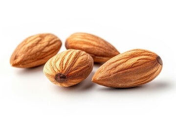 Wall Mural - A group of nuts sitting on a white surface, suitable for food or decorative uses